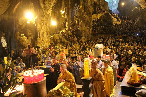 A devout ceremony inside Huong Tich Cave