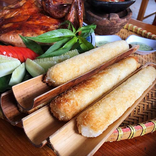 Com lam (Rice cooked in bamboo tubes) - a must-taste specialty in Mai Chau
