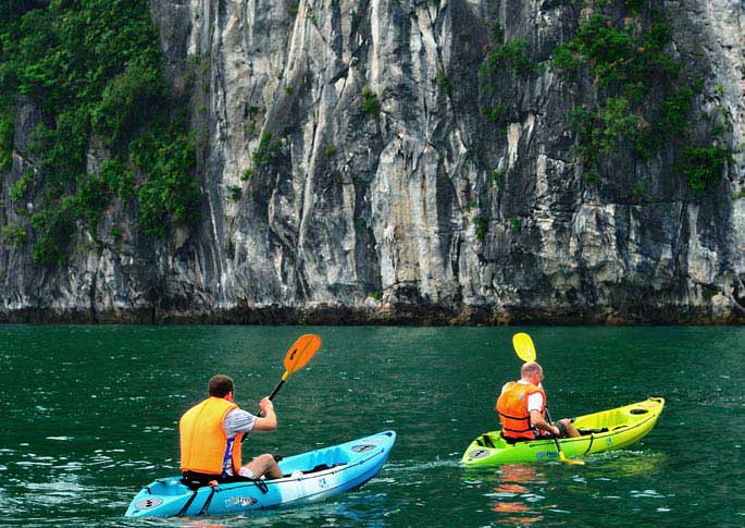 Kayaking to explore Ha Long Bay